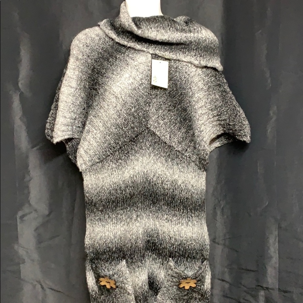 This sweater dress is the BOMB! Two front pockets!